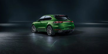 Man Stepping Out of the Porsche Macan St. Louis MO