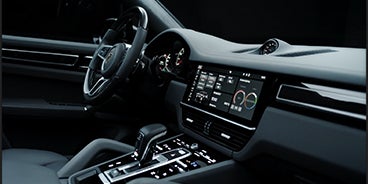 Couple Driving Porsche Cayenne in St. Louis MO