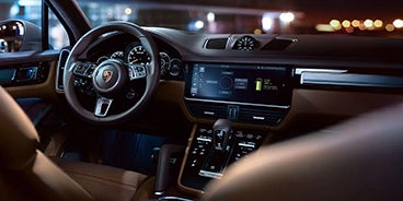 Couple Driving Porsche Cayenne in St. Louis MO